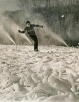 man skiing, black and white photo