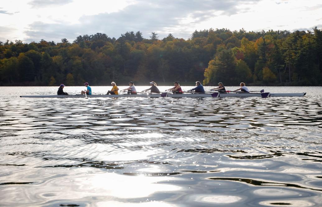 crew boat on calm water