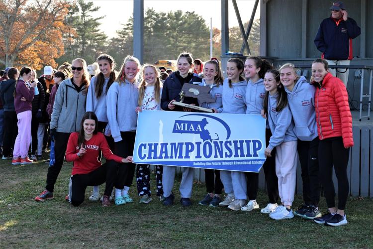 Mount Greylock poses with a trophy and banner