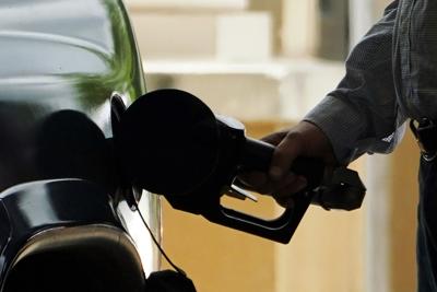 Hand holding gas nozzle (copy)