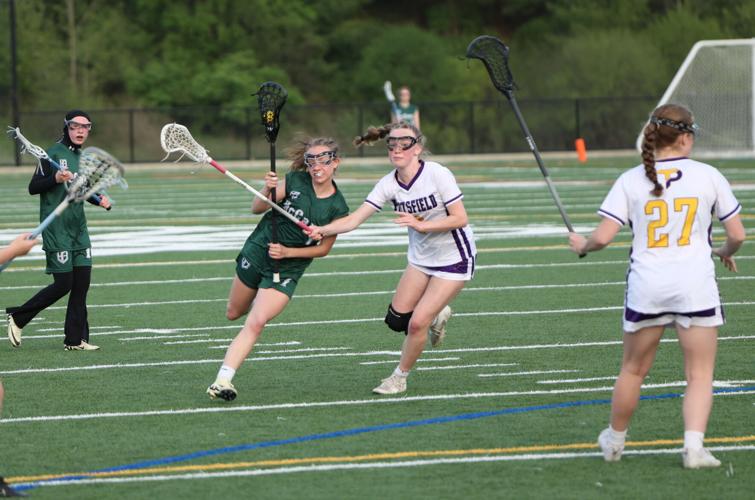 Jordyn Lloyd and Ella Klobos play lacrosse
