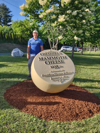 Adams artist Brent Whitney poses with his replica of The Mammoth Cheese