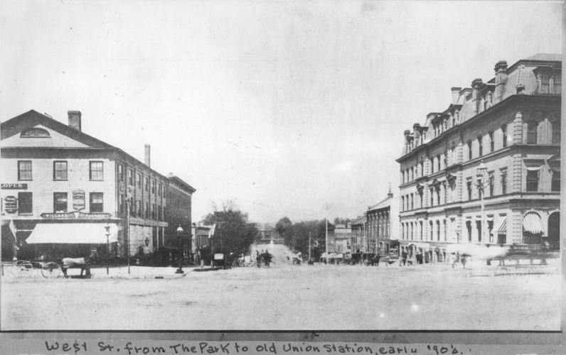 A view of West Street, Pittsfield, taken from Park Square, circa 1890s. The Berkshire Life Insurance building, on the right, has its original marcand-style roof. The original Union Station can be seen in the distance.