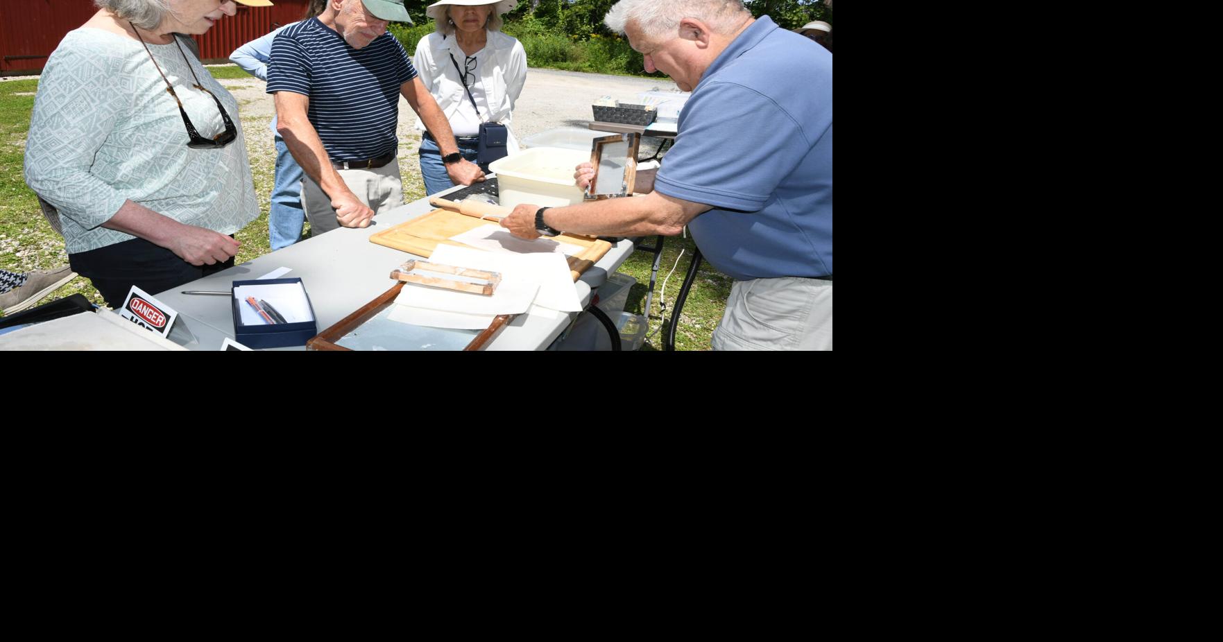 Sheets of history: Visitors enjoy the art of making paper by hand at Arrowhead