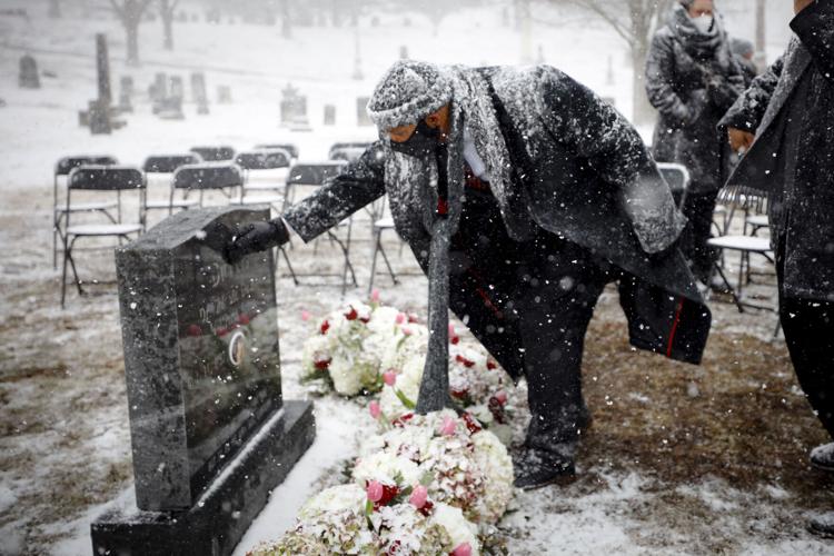 jeffrey peck touches mother's headstone in snow