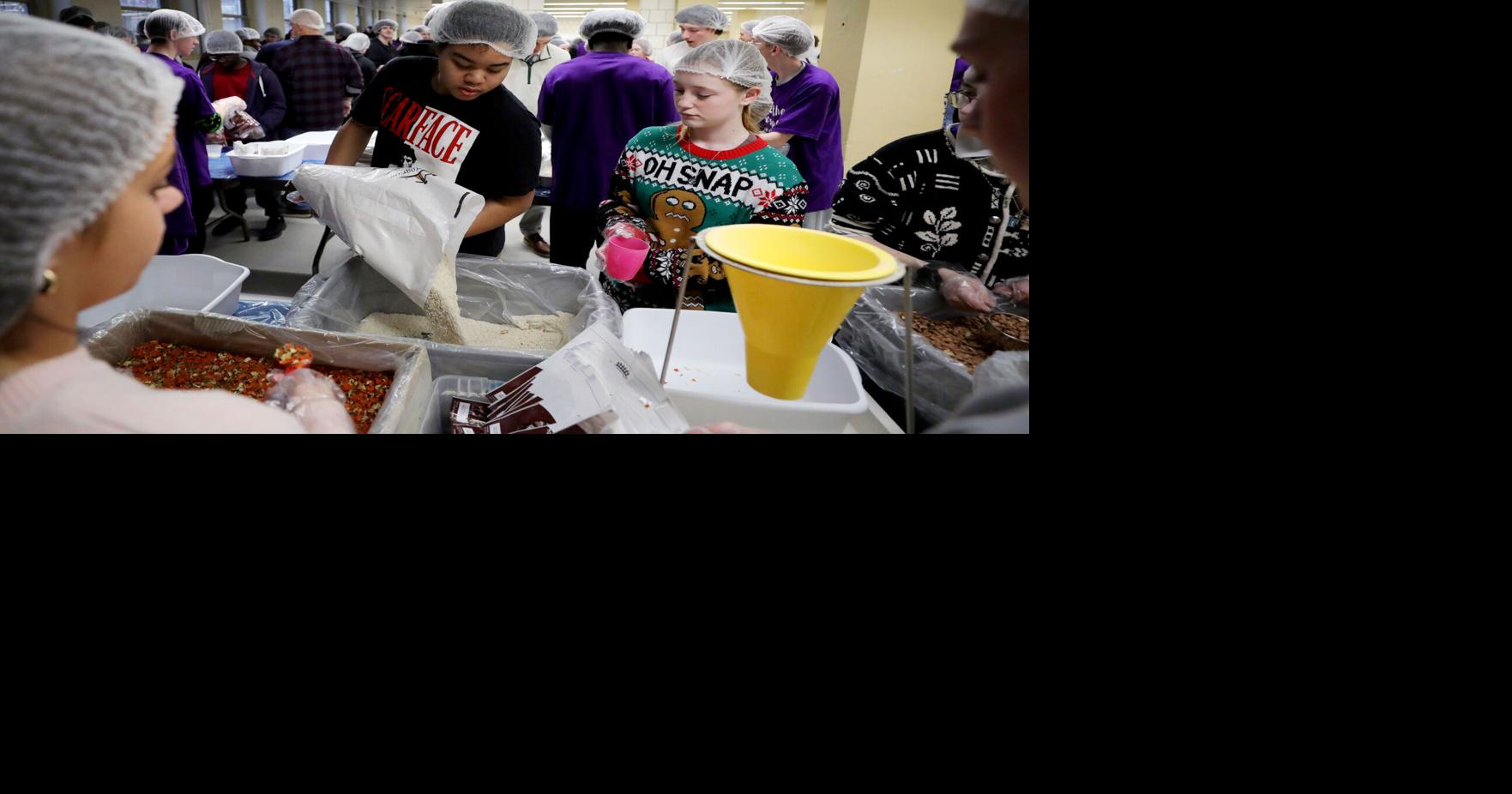 On eve of winter break, Pittsfield High students pack 10,000 meals for neighbors