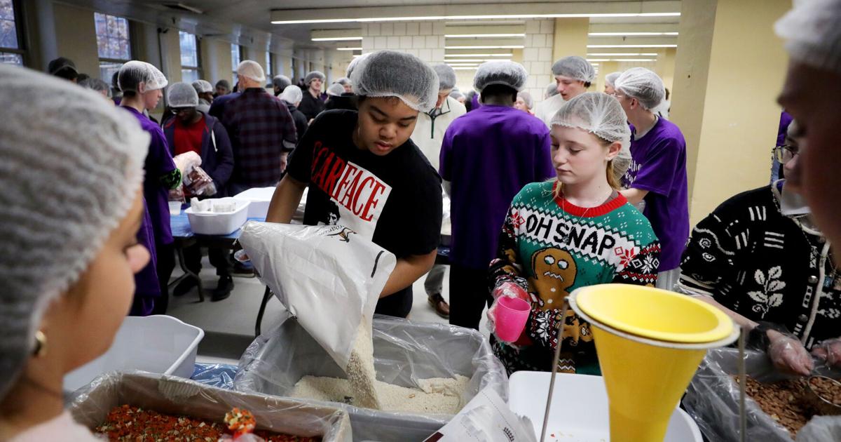 On eve of winter break, Pittsfield High students pack 10,000 meals for neighbors