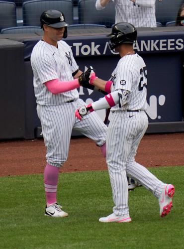 Yankees third string catcher KYLE HIGASHIOKA homers into the second deck in  left field