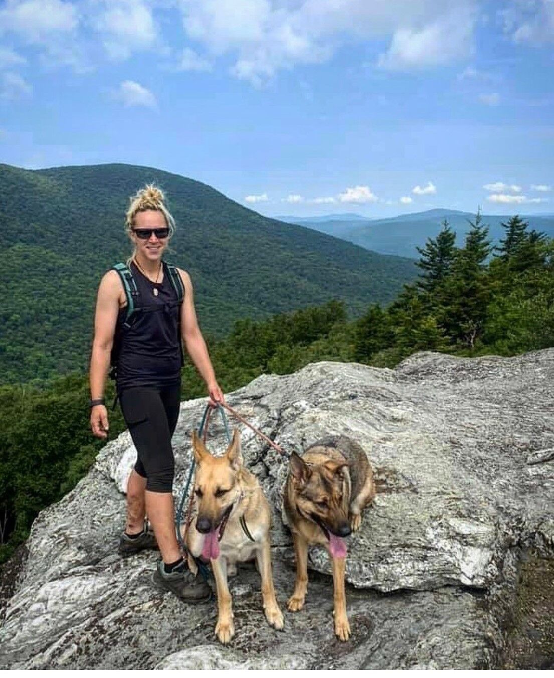 Francoeur with dogs on hike (copy)
