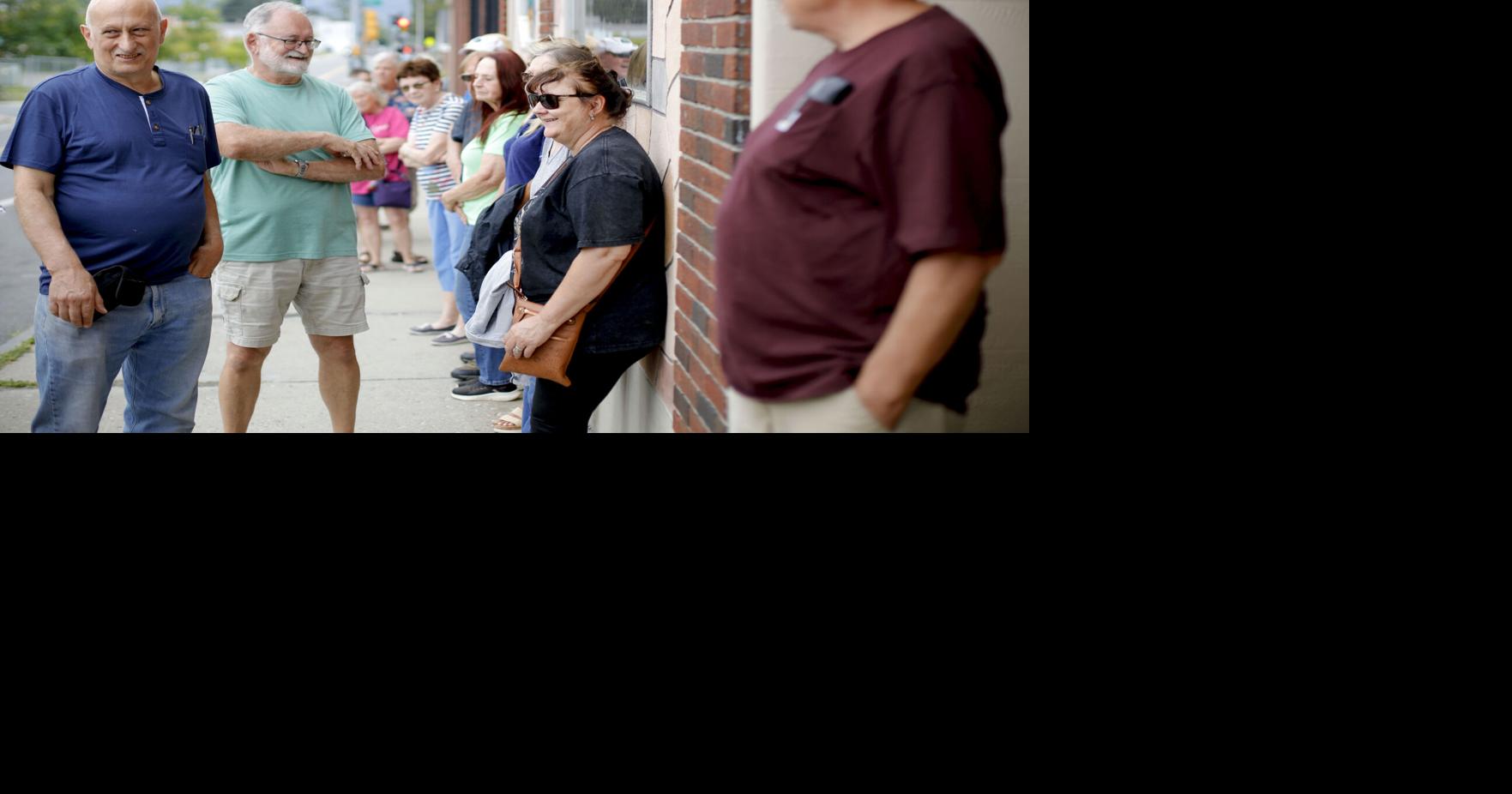 people in line outside restaurant