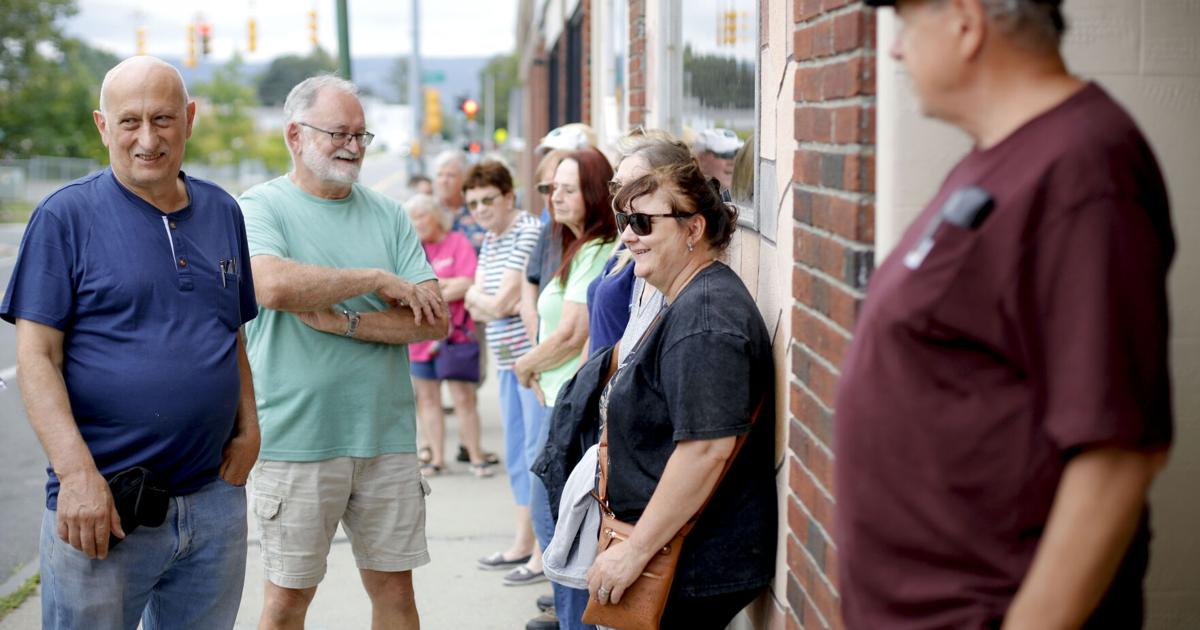 people in line outside restaurant