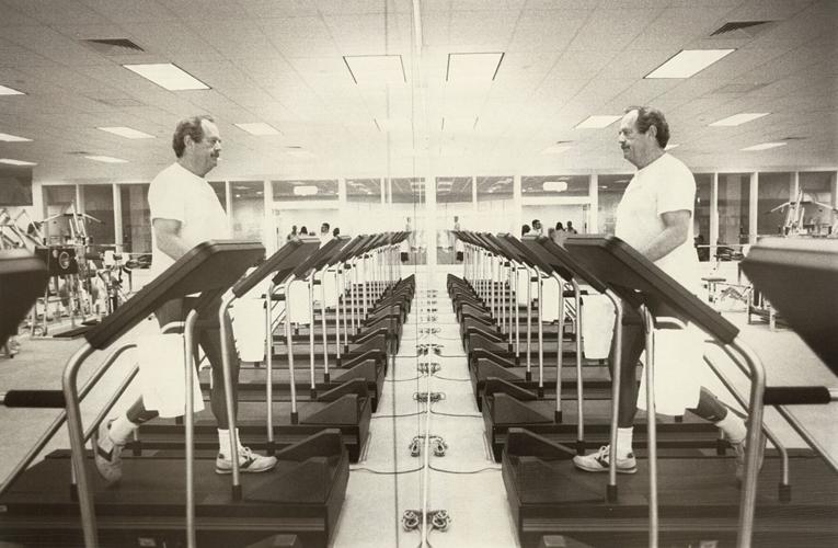 Twenty treadmills line the mirror wall of the exercise room which also contains rowing machines, bicycles and Kaiser equipment, Nov. 30, 1989