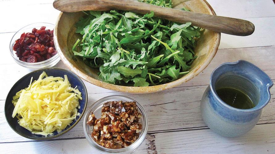 Pecan praline is standout in arugula salad