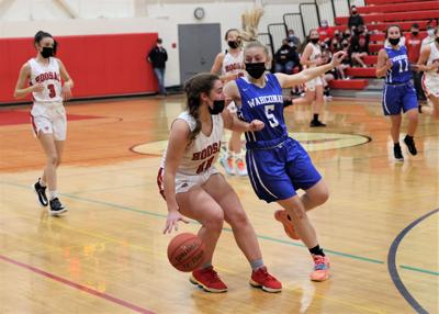 hanna shea and emma belcher play basketball