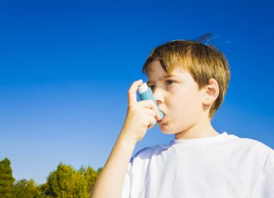 Kid using inhaler