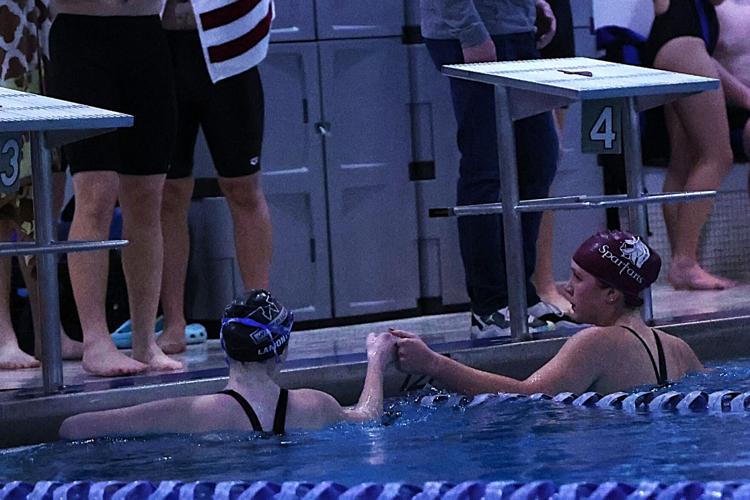 swimmers bump fists