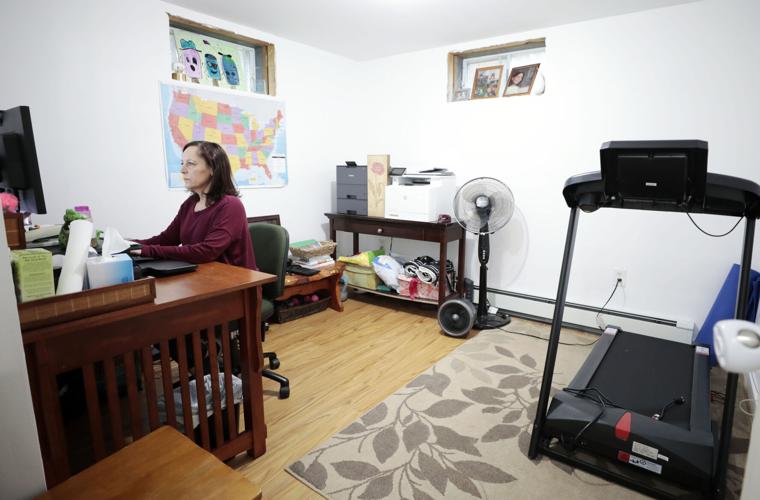 Shenna Brady in home office with treadmill