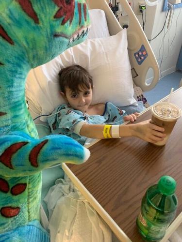 Carter with T-Rex and Starbucks