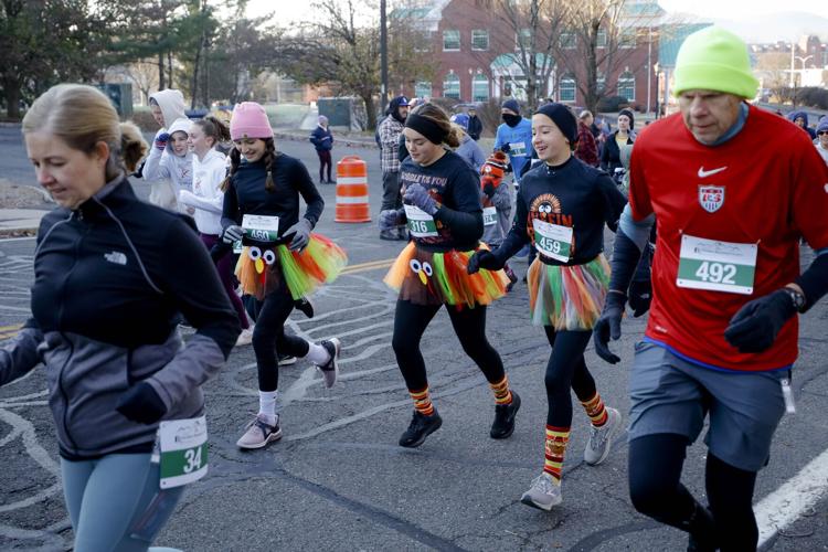 runners in Thanksgiving dress run 5k