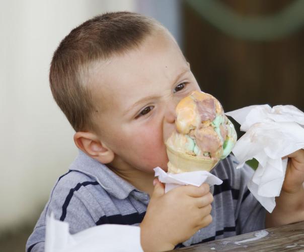 Evan Gallagher eats ice cream cone