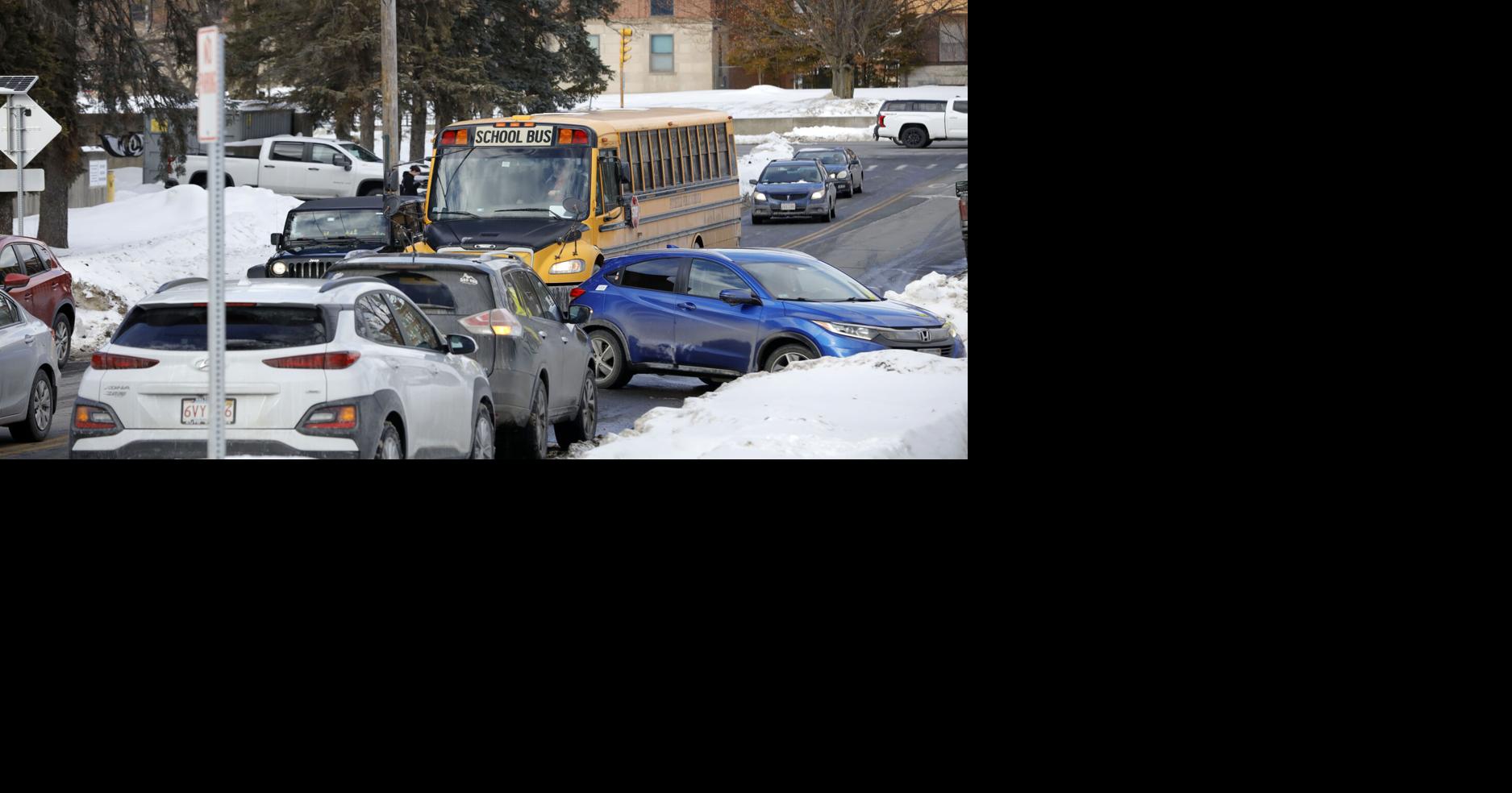 Traffic, improperly parked cars and snowbanks turn Pittsfield High school pickup into an adventure