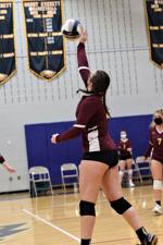 Hailey Ano hits a ball outside
