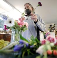 Photos: Preparing hundreds of Mother's Day flower arrangements at Wildflowers Florist
