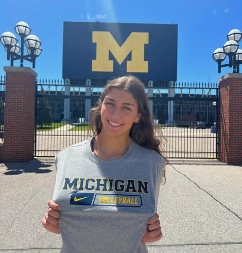 McAuley's White picks Michigan