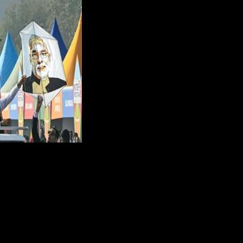 German Chancellor Friedrich Merz (L) and Indian Prime Minister Narendra Modi attended a kite flying festival ahead of their meeting