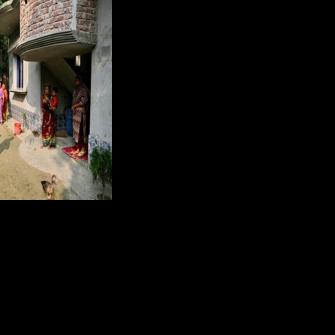 Bangladesh Nationalist Party's election candidate SM Zilany (C) speaking with residents during a visit to his electoral constituency Gopalganj