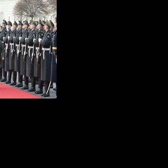 Lithuania's President Gitanas Nauseda (L) and Ukraine's President Volodymyr Zelensky review the military honour guard in Vilnius