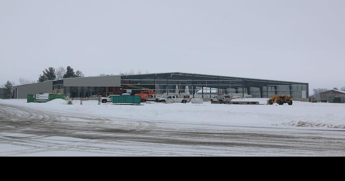 Progress Apparent On Expansion Of Building For Glass Insulators Front