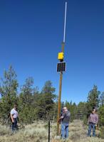 Emergency radio repeater installed above Highway 19