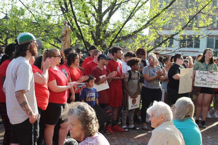 Harrisonburg community gathers to remember Calour Fields, protest gun