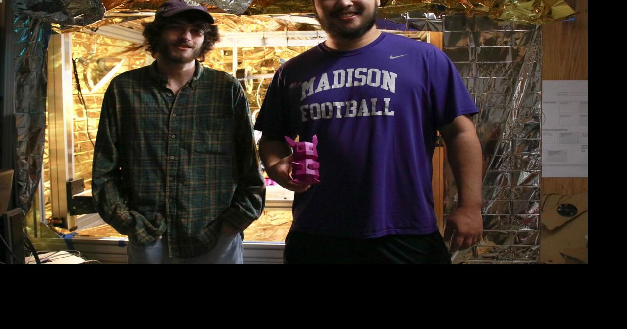 JMU student and alumnus work on 3D printer Multimedia