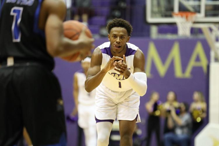 JMU men's basketball soundly defeats EMU in home opener, 8658