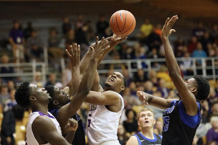 JMU men's basketball soundly defeats EMU in home opener, 8658