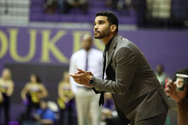 JMU men's basketball soundly defeats EMU in home opener, 8658