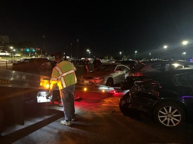 Many broken cars after a traffic accident in the parking lot of a
