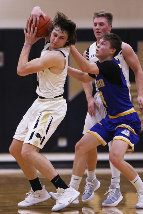 Hunter Stone fights to pull a passed ball