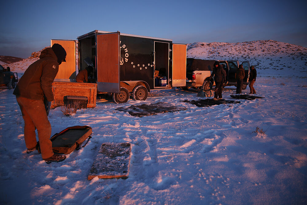 University of Wyoming students set up the work station