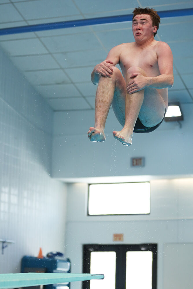 Josiah Bartlett tucks his knees during one of his dives