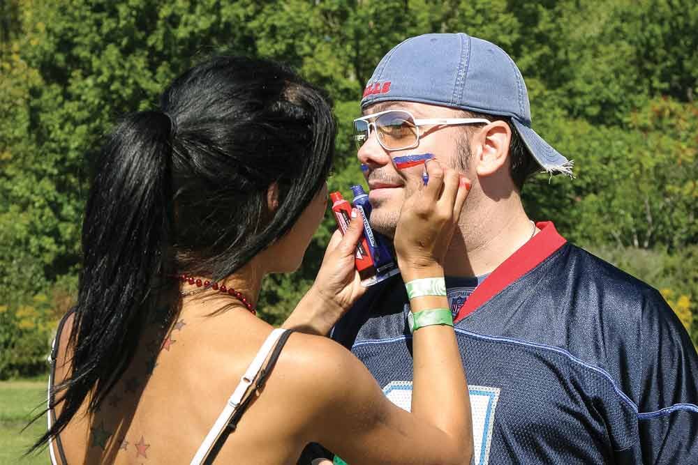 Buffalo Bills fan paints home in team colors to spite neighbor