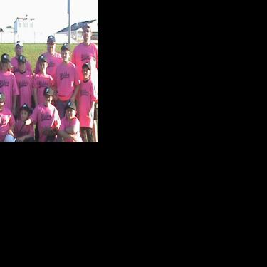 Pitching in pink: Manton baseball team plays for breast cancer ...