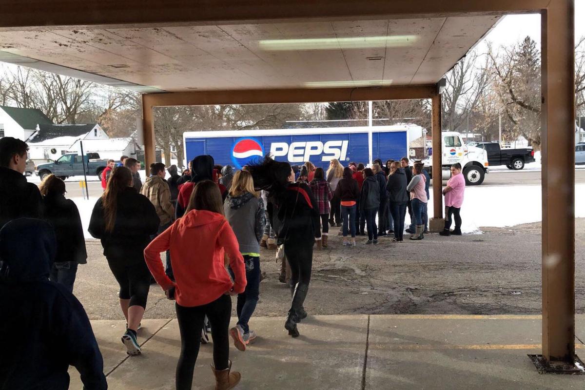 Students at several area schools walk out for moment of silence News