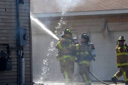 Firefighters battle storage unit fire on two fronts | Local News ...