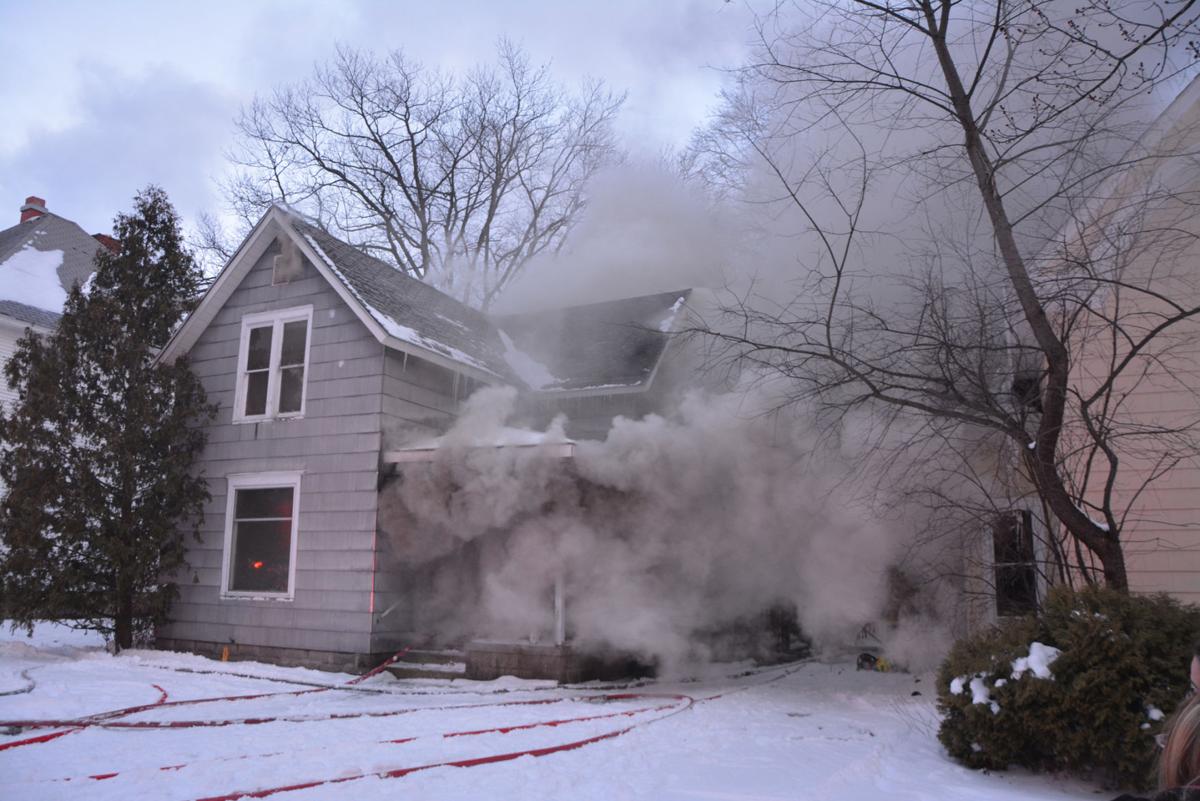 Crews battle house fire in Cadillac