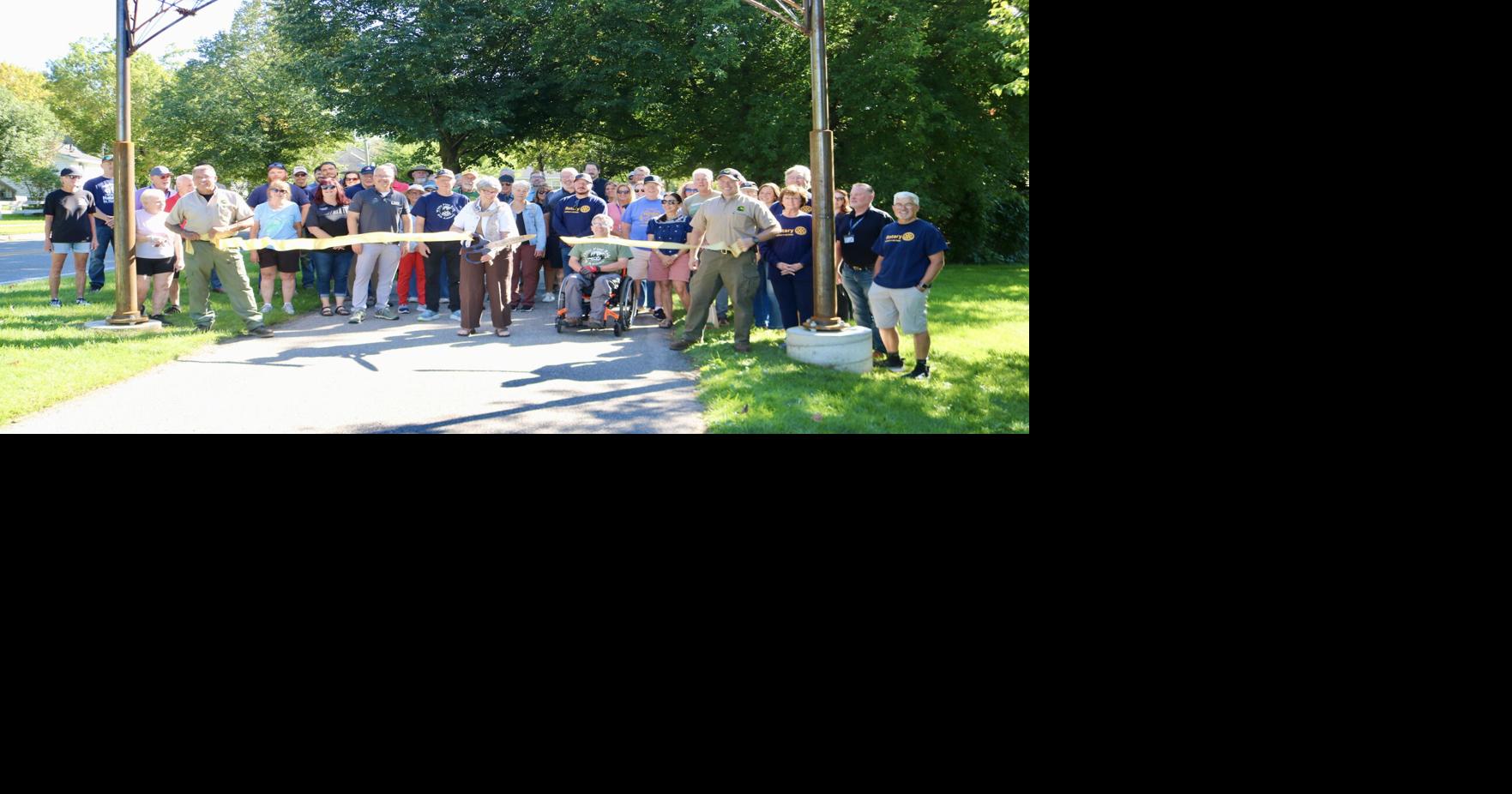 Ribbon cutting held for new White Pine Trail archway