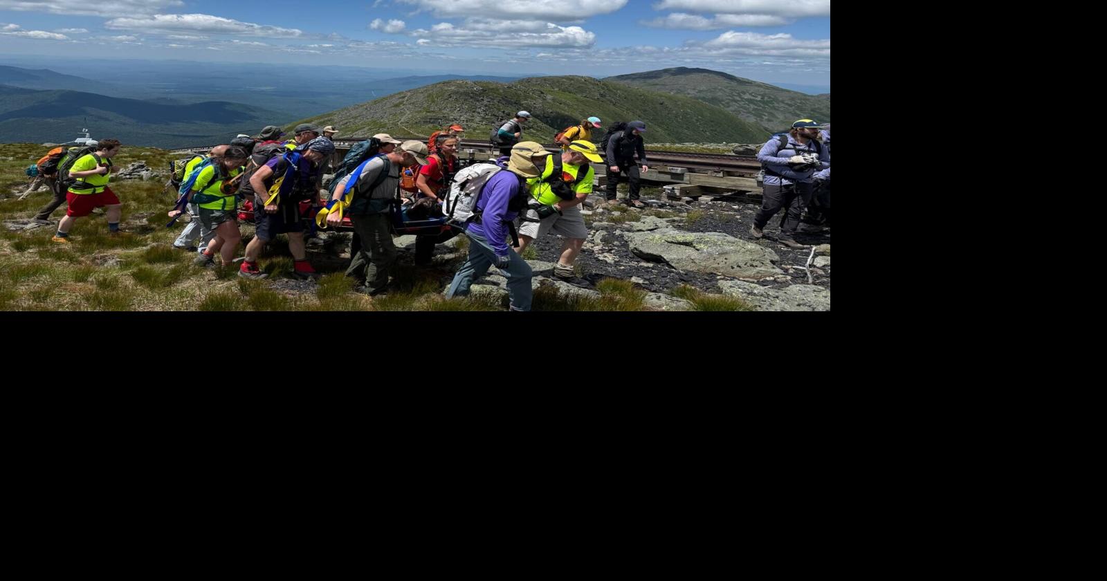 Rescuers Carry Injured Hut Worker Off Mount Washington