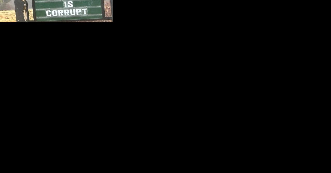 Woman Charged For Provocative Signs - Vimarsana News